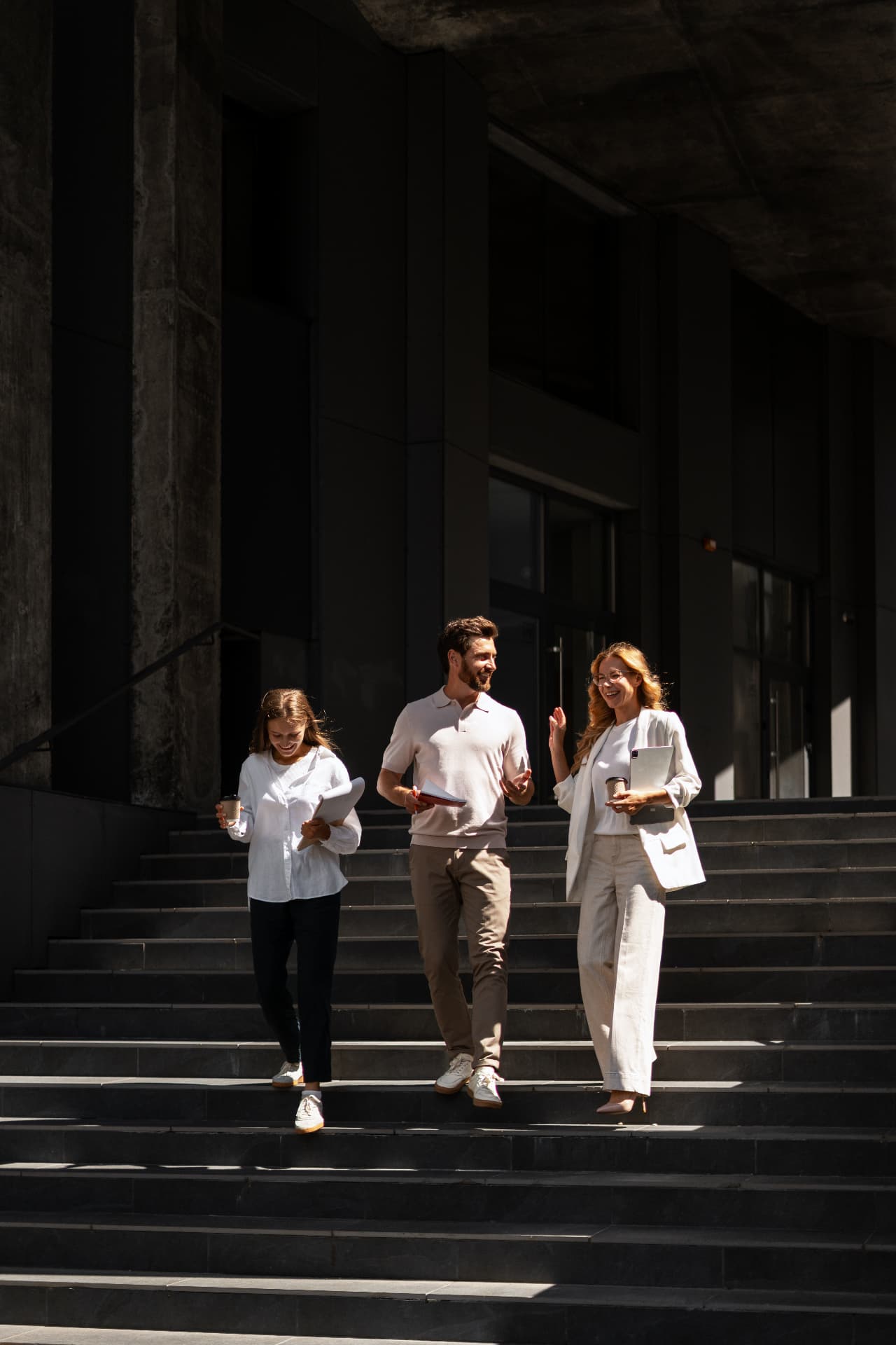 Researchers and public-sector professionals working together in an institutional building